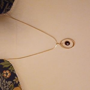 Goldtone chain with pendant